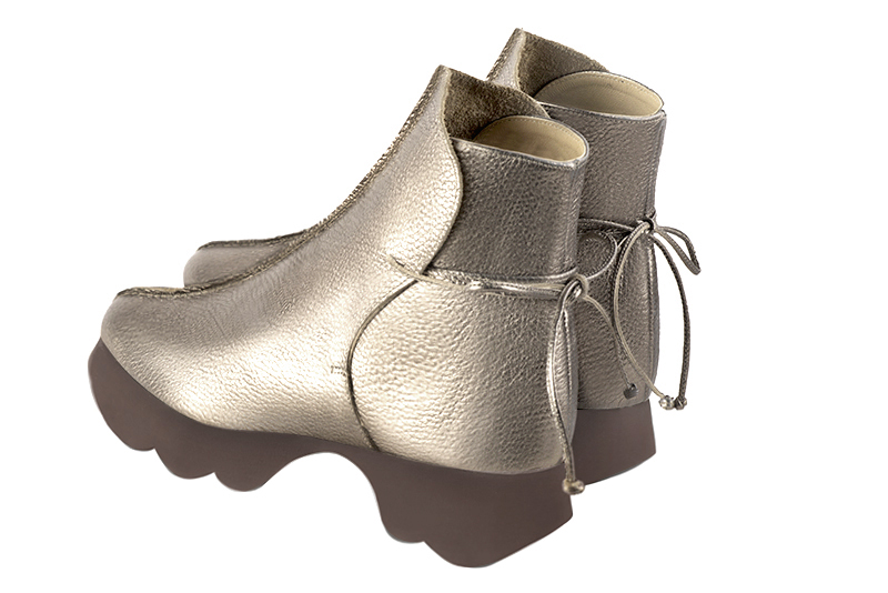 Women's gold back lace-up ankle boots with round toe and chunky rubber sculpted sole - Rear view